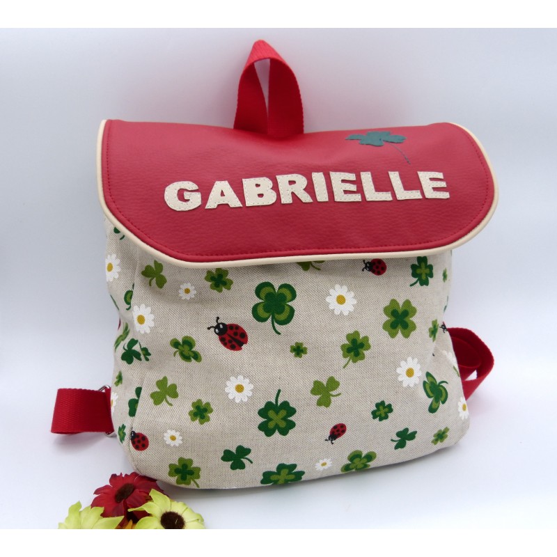 Sac à dos personnalisé - Coccinelle. Bretelles réglables et prénom en cuir. Sac à dos personnalisé - Coccinelle. Bretelles réglables et prénom en cuir.