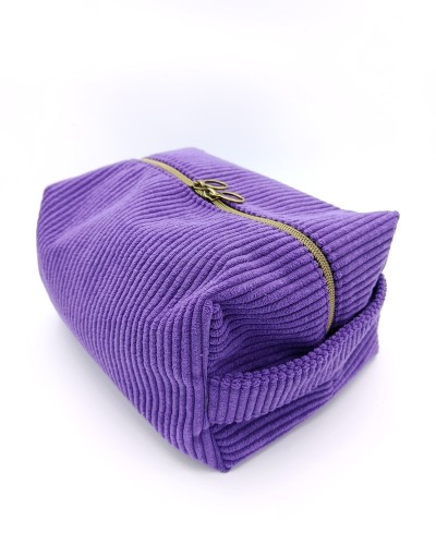 Trousse de toilette : velours violet . Imperméable.